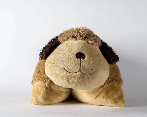 Close up of pillow pet folded in to the pet shape.
