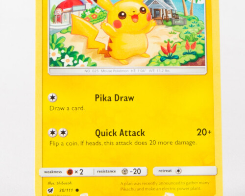 Front of "Pikachu" Pokemon card. Depicts a mouse-style Pokémon in the art. Two powers are described below.