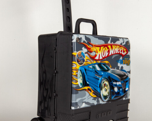 Hotwheels car container. Black box with rolling handle. Front has decal with car.