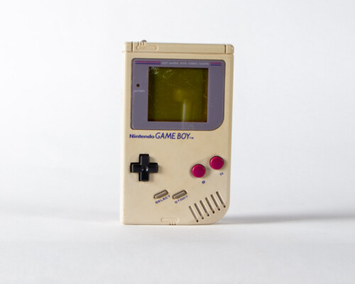 Nintendo Gameboy. Grey shell with black and red buttons.