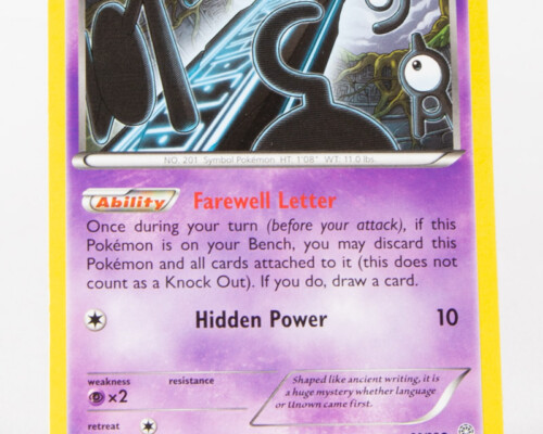 Front of Pokémon card. Shows the art of the "Unown" Pokémon with its two powers below.