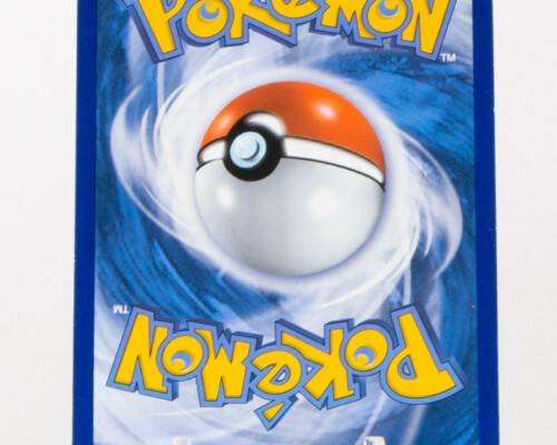 Reverse of Pokémon card. White and blue swirl pattern with yellow and blue text. Pokeball in the center.