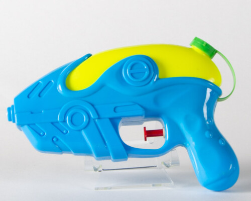 Blue and yellow water pistol with red trigger.